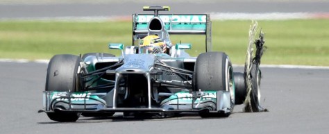 Lewis-Hamilton-with-a-burst-tyre